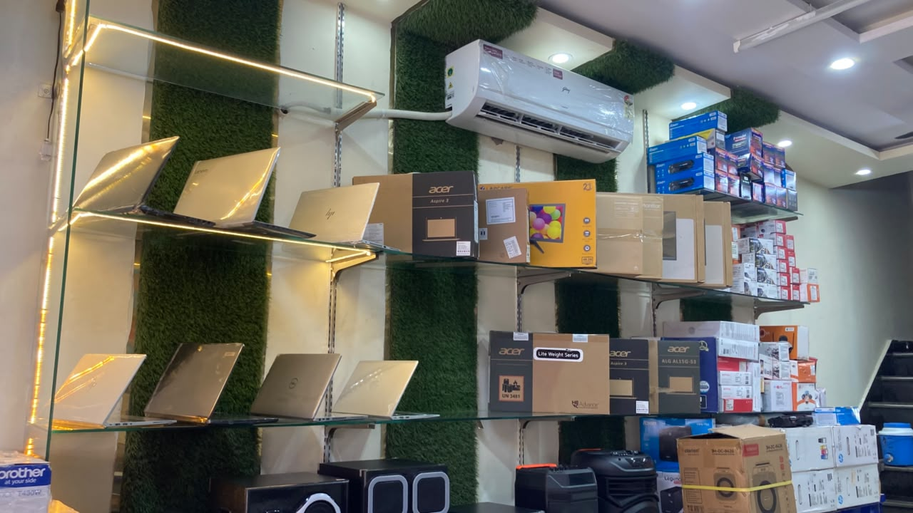 Real laptop and electronics display at Computer Bazar in Kasganj